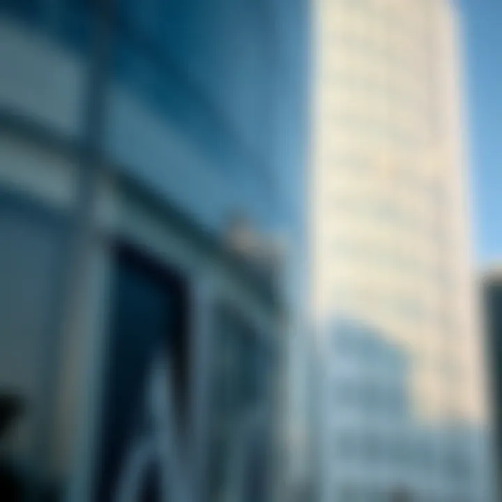 Close-up of the reflective facade of Aldar HQ highlighting its innovative materials