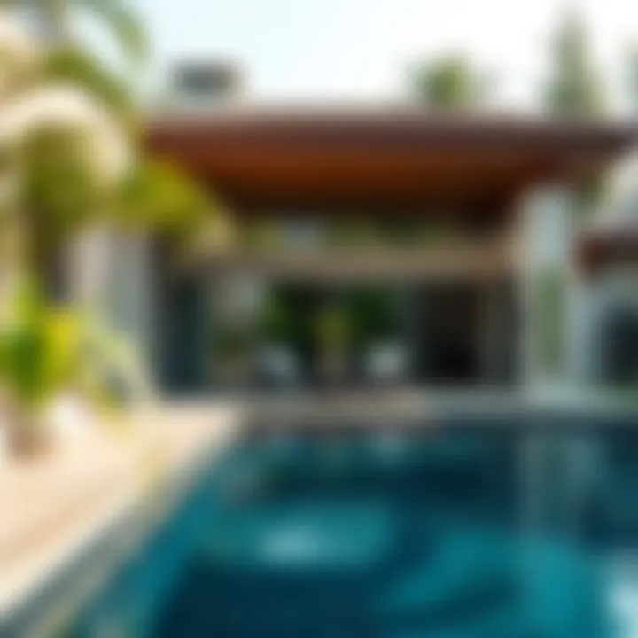 Opulent outdoor living space featuring a lavish pool area amidst lush greenery