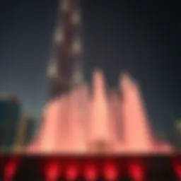 The Burj Khalifa illuminated at night with the Fontaines in action